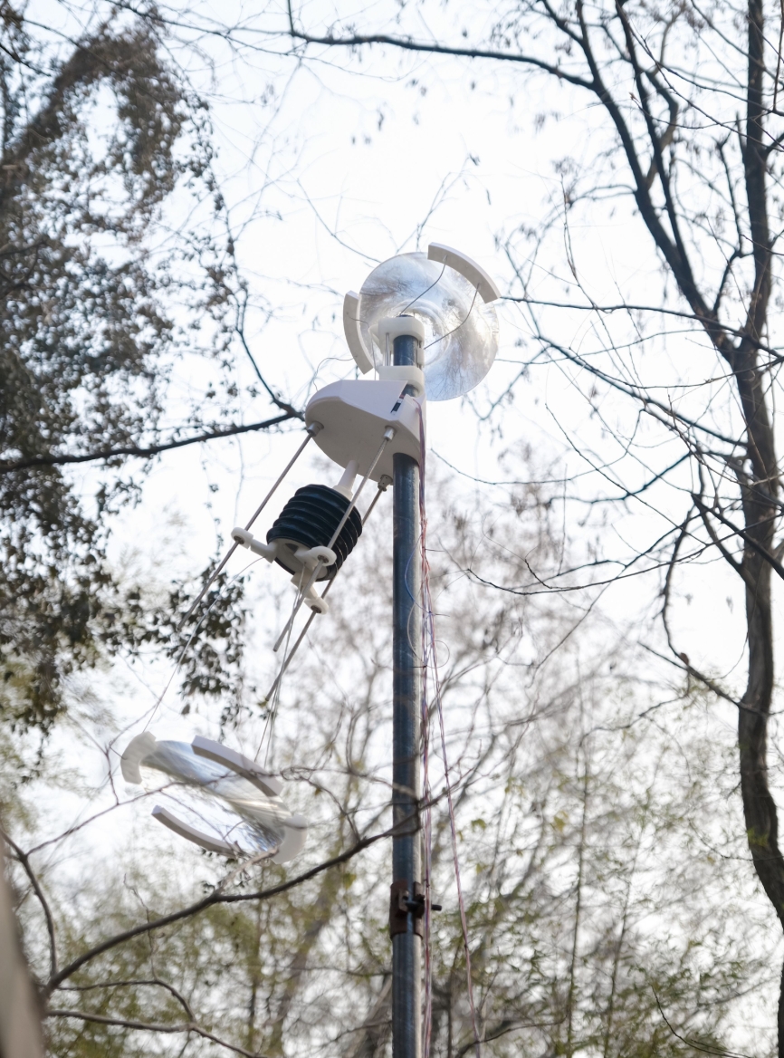 Light-redirection device installed among trees