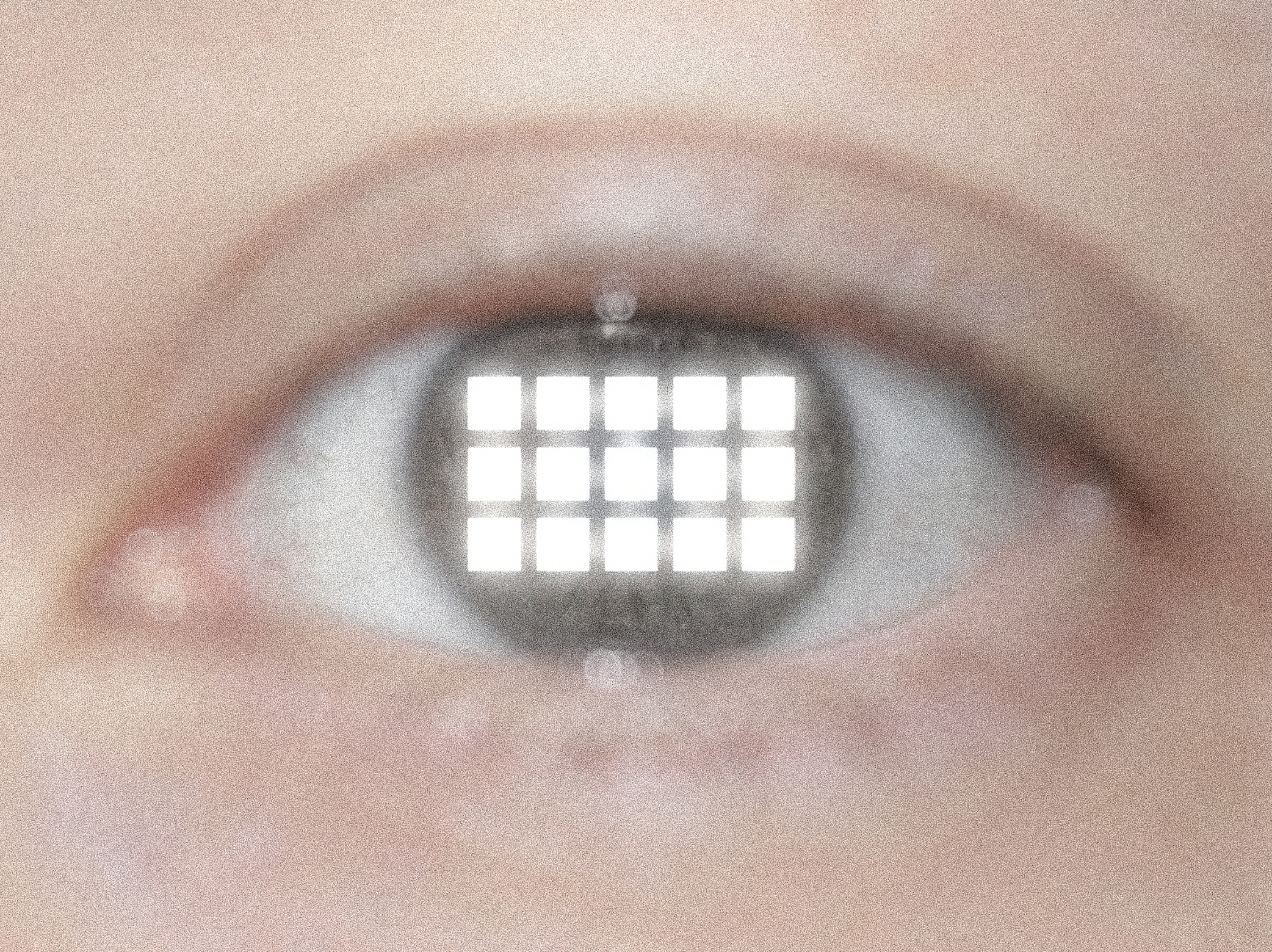 Eye reflecting a grid of fifteen illuminated squares