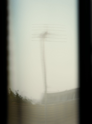 Blurred view of an antenna through a window