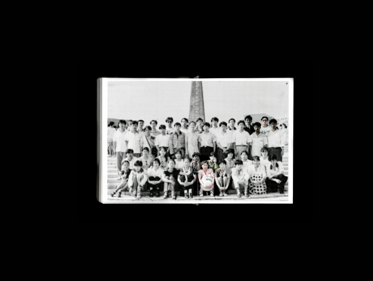 Artist book spread containing a composite family portrait