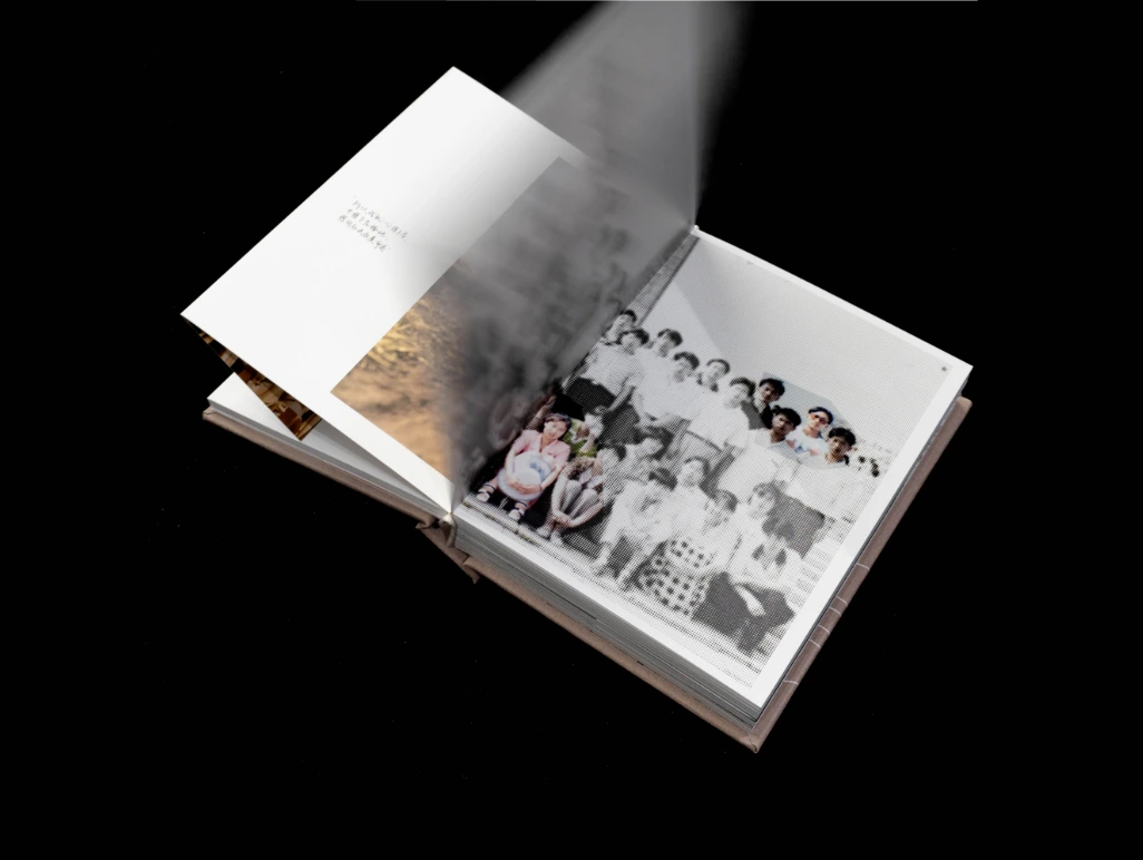 Artist book seen from the side on a black background